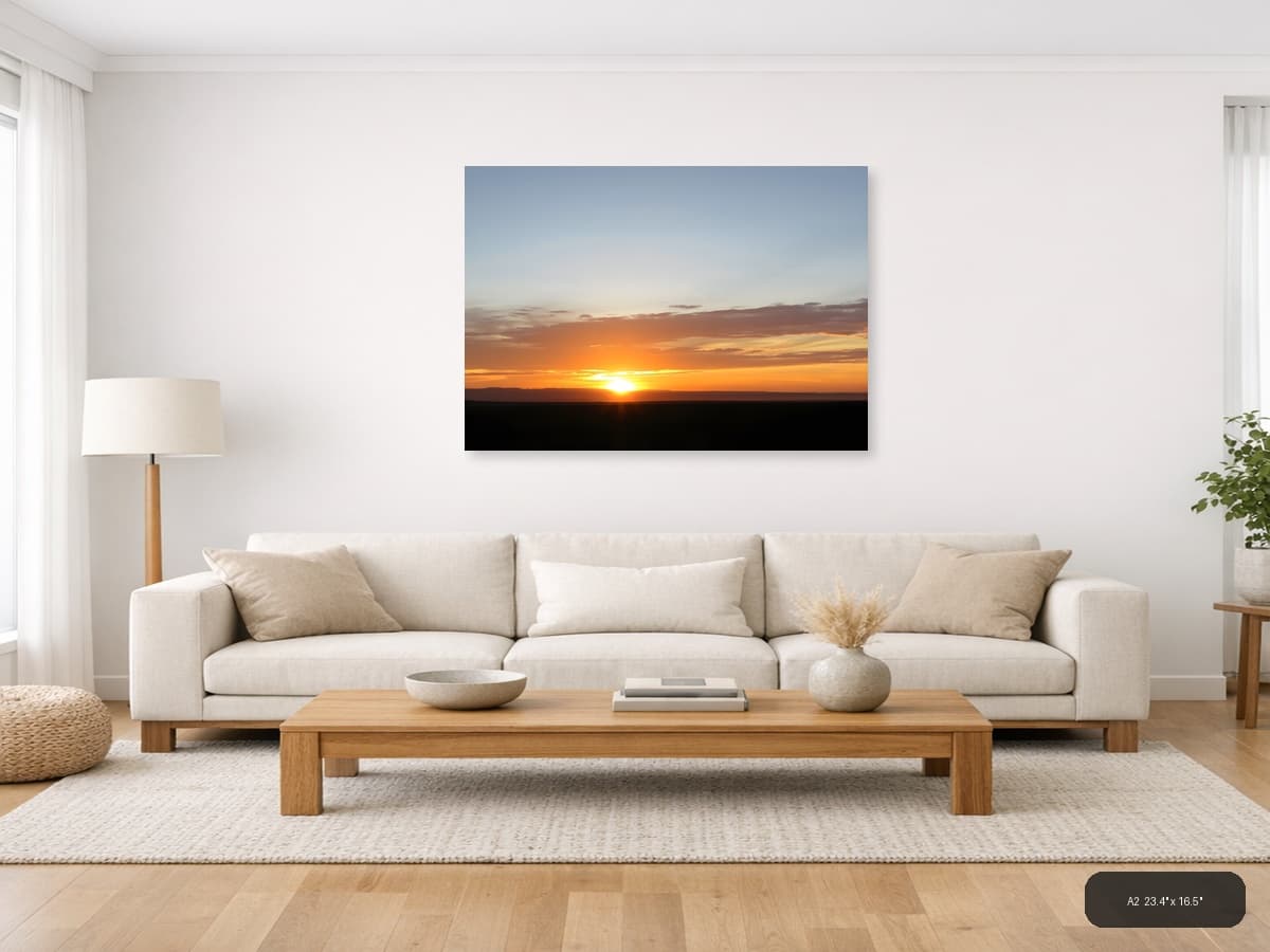 Minimalist Golden Sunset Over Dark Horizon Wall Art shown in a room setting at A2